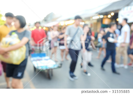 Blurred people walking in Chatuchak market street 31535885