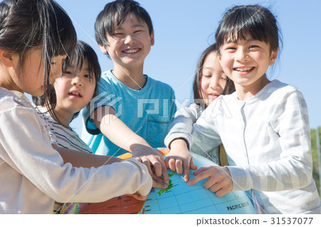 Elementary school student with globe Elementary school student with globe 31537077