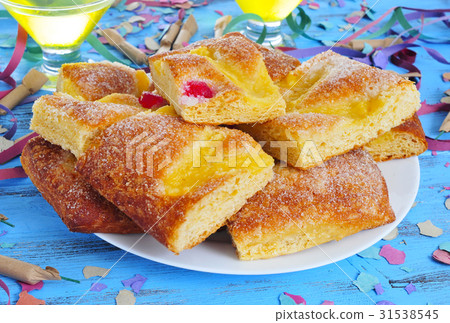 coca de Sant Joan, sweet cake from Catalonia Spain coca de Sant Joan, sweet cake from Catalonia Spain 31538545