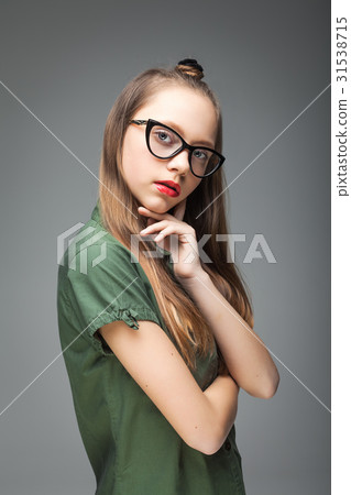 young girl with trendy glasses 31538715