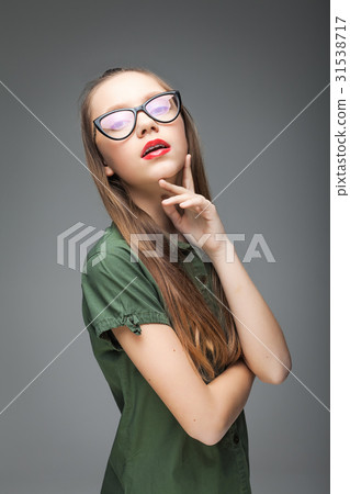 young girl with modern glasses young girl with modern glasses 31538717