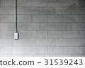 Steel pipe electric wire and plug on cement wall  31539243