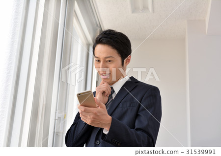 Business scene, smartphone, businessman Business scene, smartphone, businessman 31539991