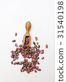 Organic red beans and olive wood scoop on whie 31540198
