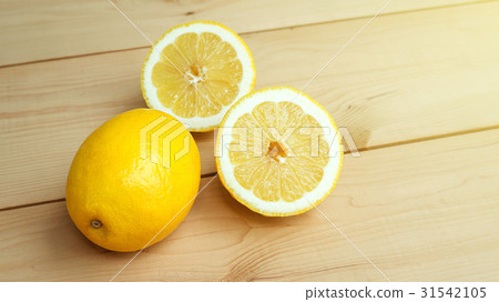 lemons on a wooden table. lemons on a wooden table. 31542105
