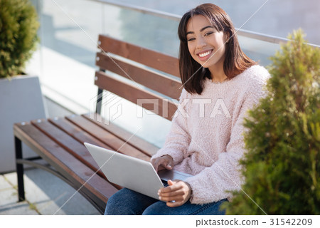 Bright curious woman searching for something 31542209