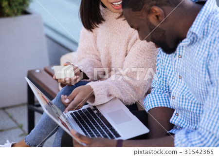 Attentive elegant lady pointing out a nice item Attentive elegant lady pointing out a nice item 31542365