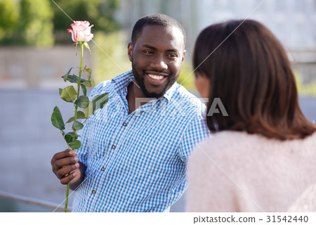 Bright handsome guy being a real gentleman 31542440