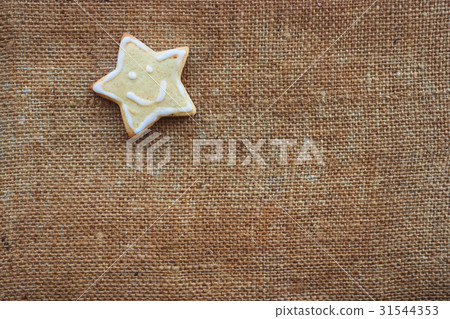One christmas cookie on the flax texture One christmas cookie on the flax texture 31544353