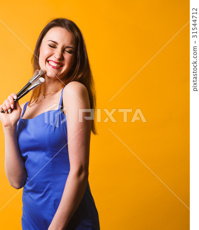 Girl in dress with brushes background Girl in dress with brushes background 31544712