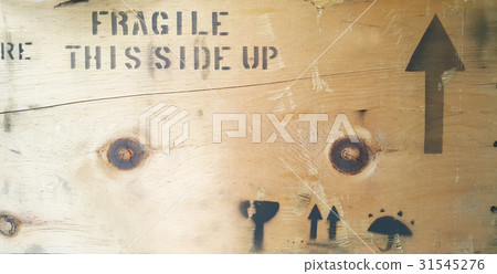 Fragile message type printed on wooden box Fragile message type printed on wooden box 31545276