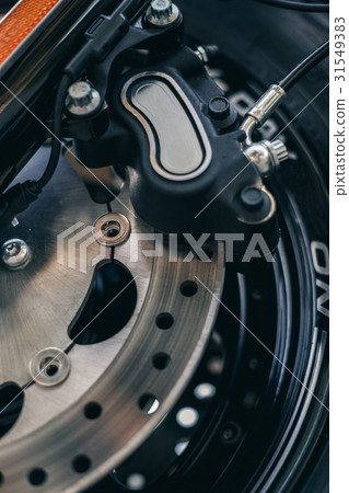 Motorcycle wheel details with brake and wheel Motorcycle wheel details with brake and wheel 31549383