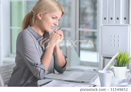 woman working with laptop woman working with laptop 31549652