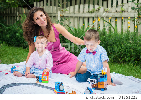 Happy mother and two children Happy mother and two children 31551222