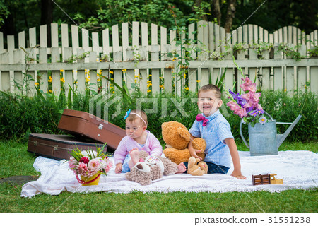 Girl and a boy in garden Girl and a boy in garden 31551238