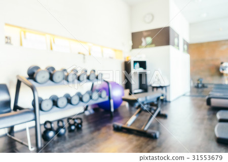 Abstract blur gym and fitness room interior Abstract blur gym and fitness room interior 31553679