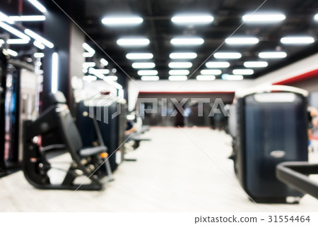 Abstract blur gym and fitness room interior Abstract blur gym and fitness room interior 31554464