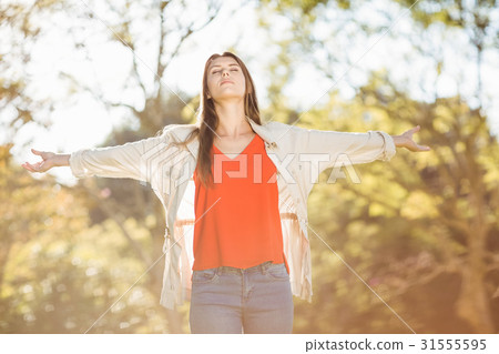 Woman stretching out her arms 31555595