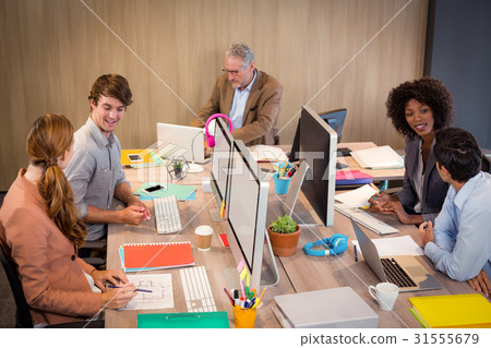 Business people interacting with each other 31555679