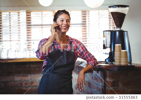 Waitress making a phone call 31555863