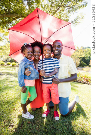 Happy family posing together Happy family posing together 31556438