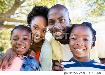 Happy family posing together Happy family posing together 31556683