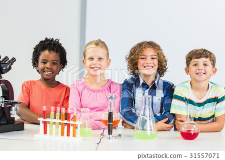 Portrait of kids doing a chemical experiment in laboratory 31557071