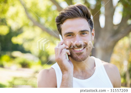 Man talking on mobile phone Man talking on mobile phone 31557209