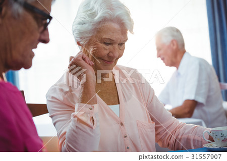 Senior smiling woman with a cup of coffee 31557907