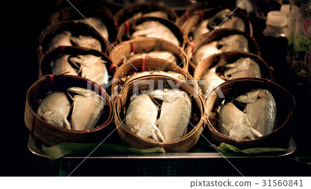 mackerel in round bamboo baskets. mackerel in round bamboo baskets. 31560841