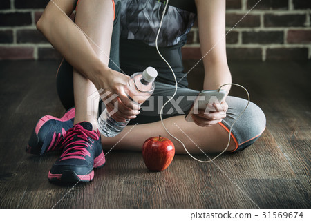 take rest listening to music eating apple 31569674