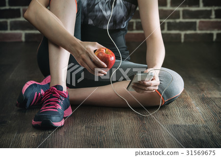 take rest listening to music eating apple 31569675