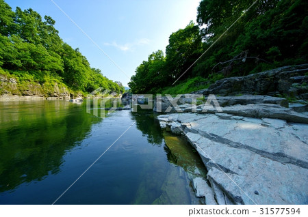 Fresh green and rocky sky reflected on the clear water surface of Nagatoroko Valley Upstream direction from a bridge stone water pipe bridge a Fresh green and rocky sky reflected on the clear water surface of Nagatoroko Valley Upstream direction from a bridge stone water pipe bridge a 31577594