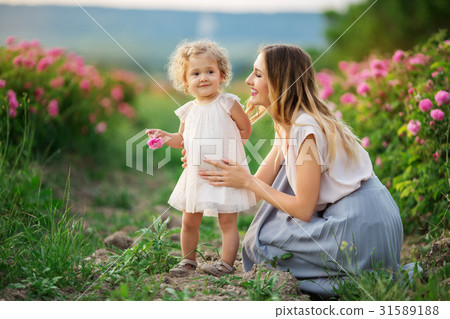 Beautiful child girl with mother are wearing 31589188