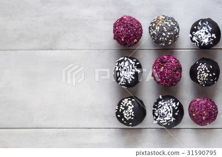 Energy balls, raw chocolate truffles from above 31590795
