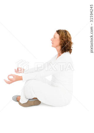Side view of woman meditating Side view of woman meditating 31594245