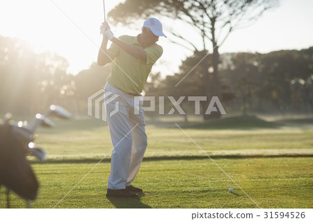 Full length of mature man taking shot Full length of mature man taking shot 31594526