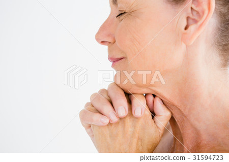 Cropped image of mature woman praying 31594723