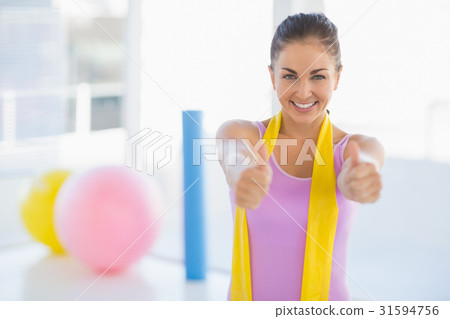 Portrait of happy woman at fitness studio Portrait of happy woman at fitness studio 31594756
