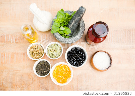 High angle view of herbs and medicines High angle view of herbs and medicines 31595823
