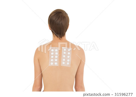 Rear view of naked woman back with bandages Rear view of naked woman back with bandages 31596277