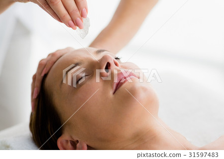 Cropped image of masseur giving massage to woman 31597483