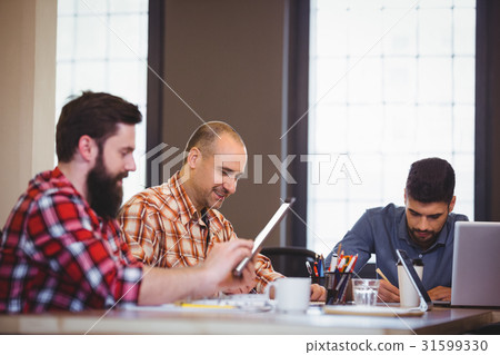 Business people working at desk 31599330