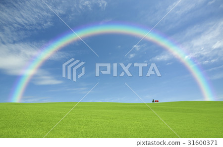 House with red roof of grassy plain and clouds and rainbow 31600371