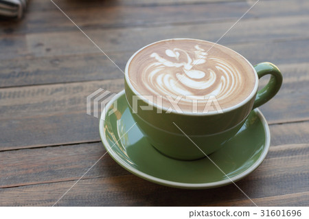 Cup of hot coffee latte with beautiful style  31601696