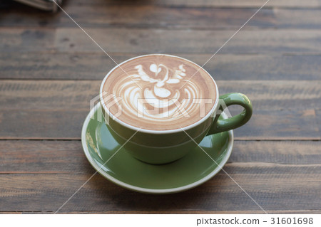 Cup of hot coffee latte with beautiful style  31601698