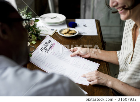 Hands Holding Wedding Planner Checklist Information Preparation Hands Holding Wedding Planner Checklist Information Preparation 31607932