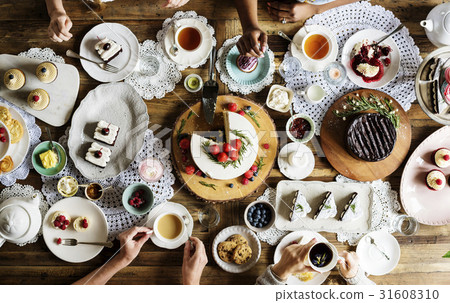 Friends Gathering Together on Tea Party Eating Cakes Enjoyment happiness Friends Gathering Together on Tea Party Eating Cakes Enjoyment happiness 31608310