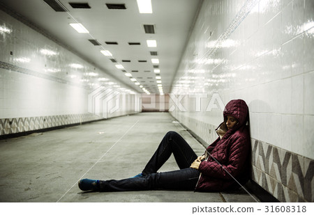 Adult Woman Sitting Hopeless on The Floor 31608318