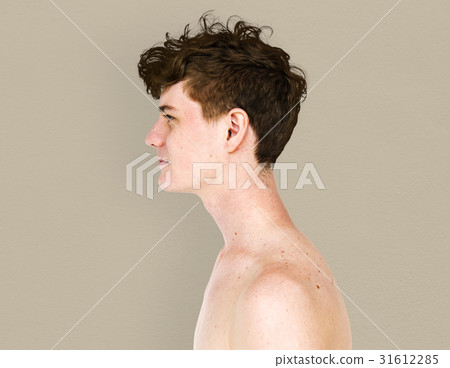 Young Adult Man with Serene Face Studio Portrait 31612285